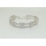 A silver CZ Chanel style line bracelet.