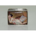 A Silver box with semi nude enamel plaque.