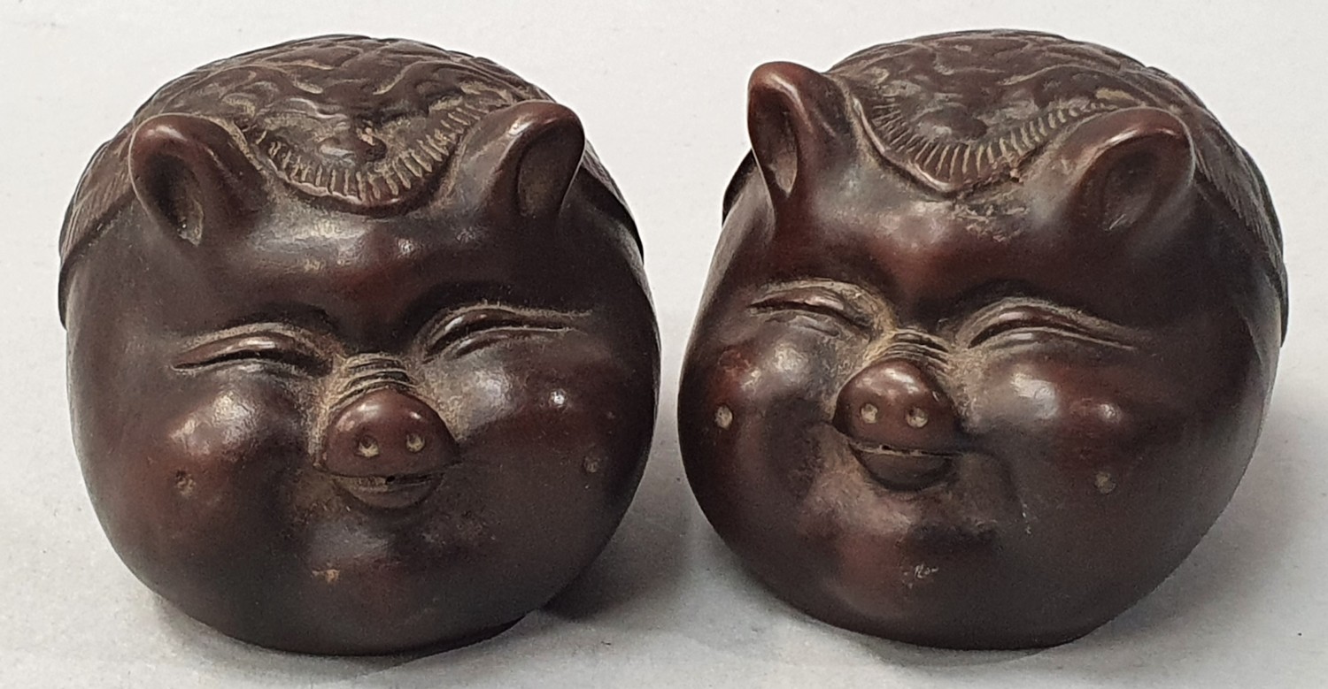 Pair of Oriental china pig rattles.