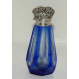 A Faceted blue glass silver topped (tested) Vinaigrette.