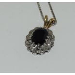 A 9ct gold Sapphire and Diamond pendant on 18ct white gold chain.