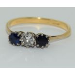 Art Deco Sapphire and Diamond 0.65ct approx, three stone trilogy ring, 2.5grams Size Q.