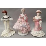 Three Coalport lady figurines.