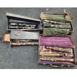 Case of vintage clarinets.