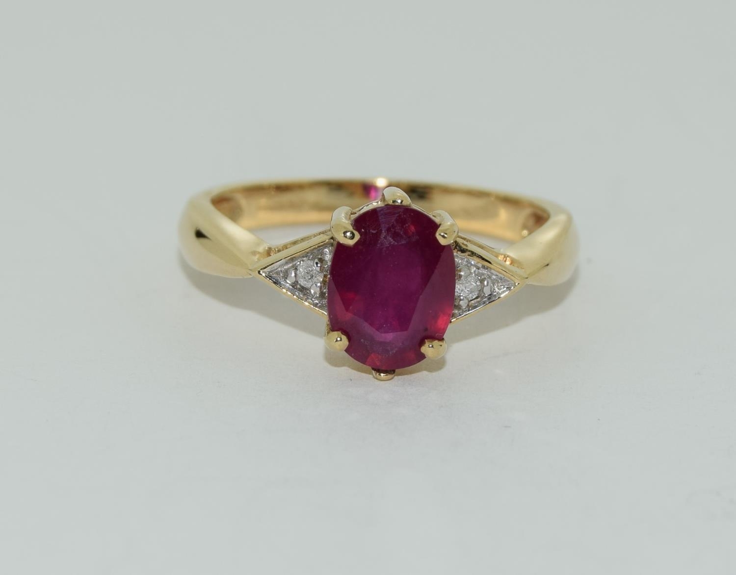 9ct gold ladies diamond and ruby ring approx 1.2ct ruby size N