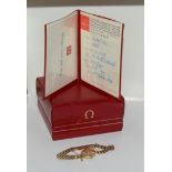 Ladies 9ct gold Omega wristwatch boxed with original purchase guarantee dated 1968