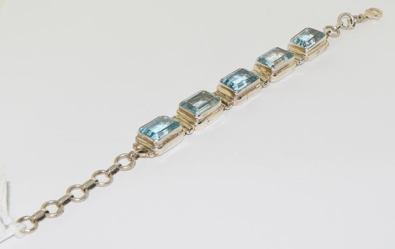 A silver blue topaz bracelet