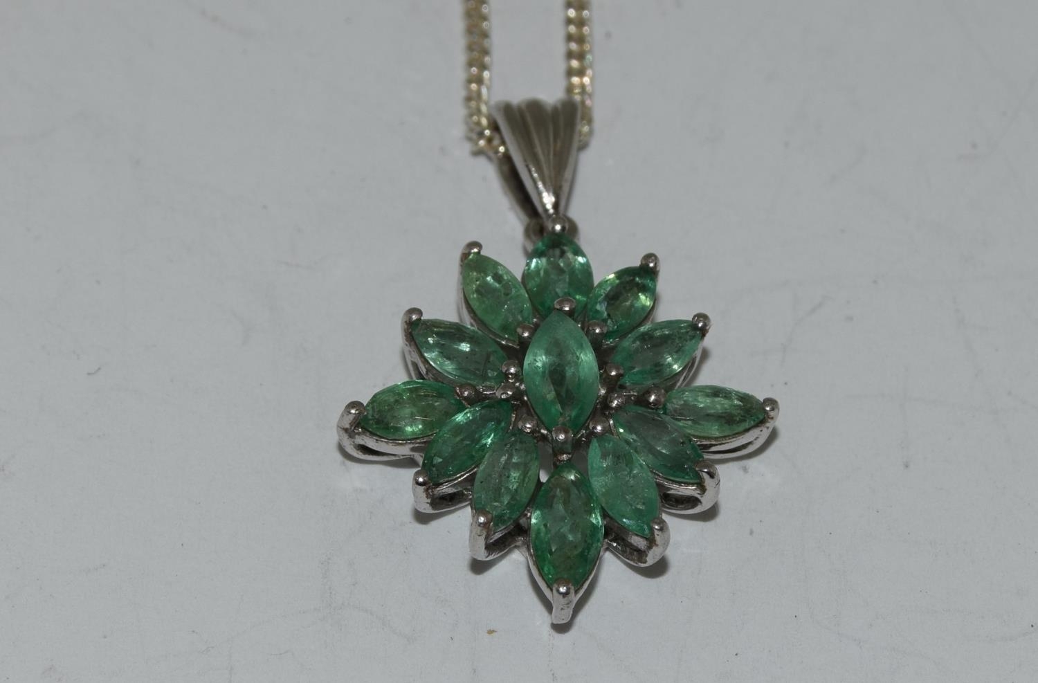 Emerald 925 Silver starburst pendant.