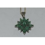 Emerald 925 Silver starburst pendant.
