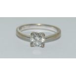 An 18ct white gold ladies diamond solitaire, approx. 1ct, Size M.