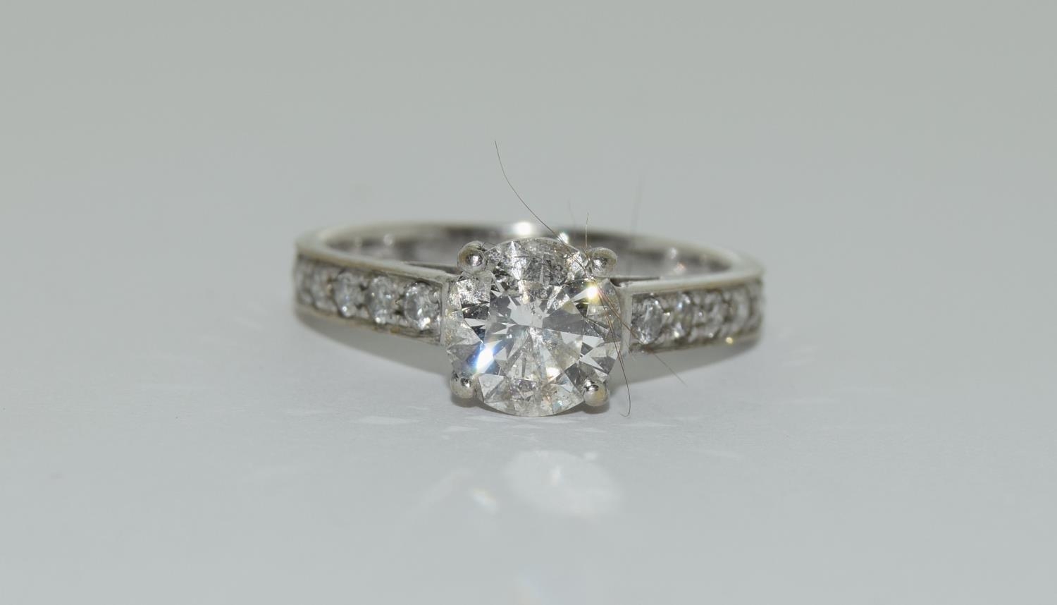 An 18ct white gold ladies diamond solitaire with diamond shoulders centre stone approx 1.3ct side - Image 6 of 6