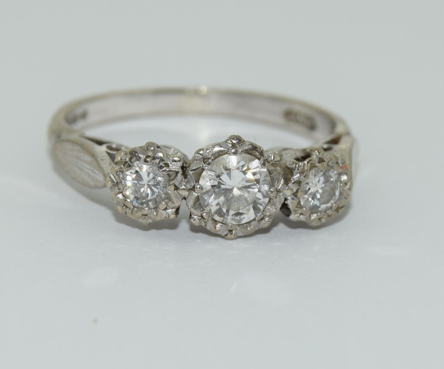 18ct white gold ladies three stone diamond ring, 80 points approx.