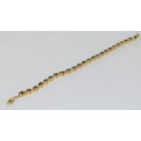 9ct gold ladies diamond and emerald tennis bracelet 24 diamonds total approx 1ct set with 25