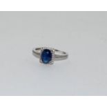 A blue stone silver ring size P