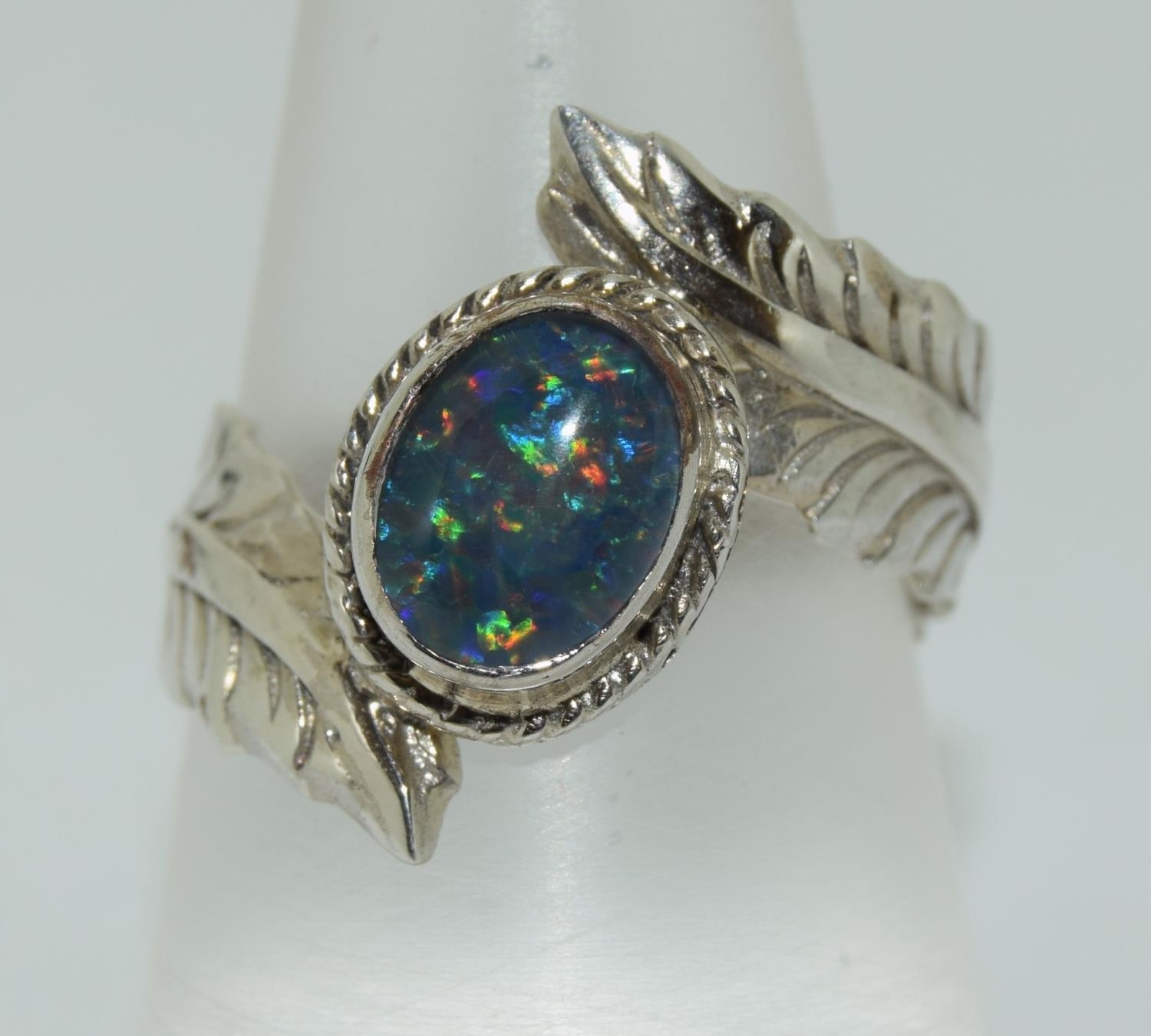 A Black opal triplet 925 silver ring, Size P.