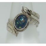 A Black opal triplet 925 silver ring, Size P.