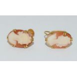 A pair of 9ct gold screw back shell cameo earrings.