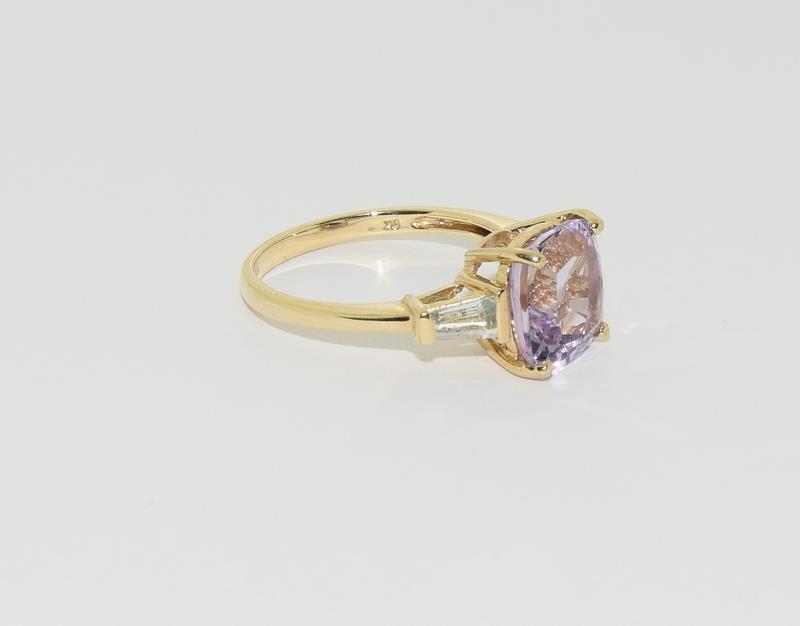 A 9ct gold Amethyst and Aquamarine ring. - Image 5 of 5
