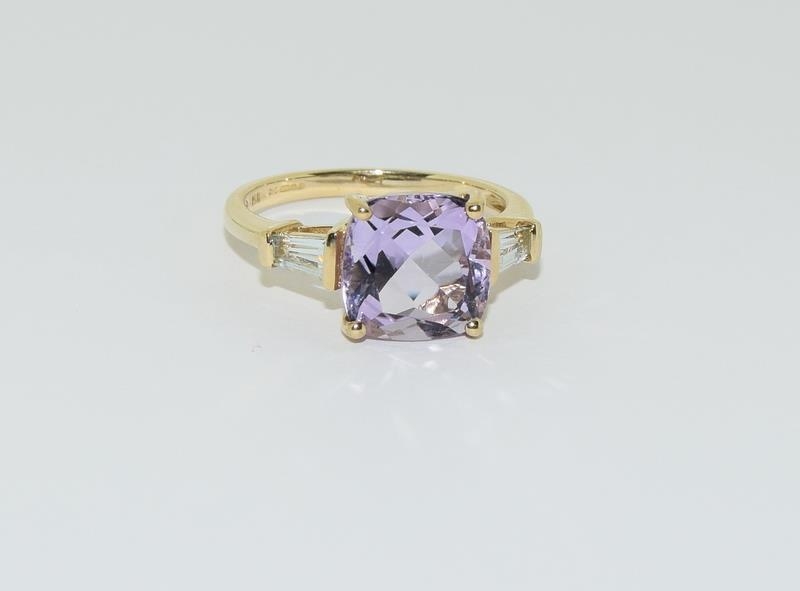 A 9ct gold Amethyst and Aquamarine ring.