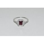 An 18ct white gold Ruby and Diamond Art Deco style ring 60 points approx.