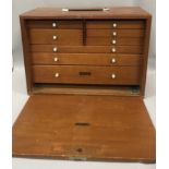 An engineers/watch makers wooden 8 draw cabinet made by Union the draws are of tapering sizes with a