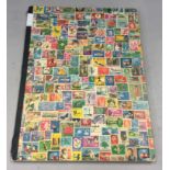 Multi coloured album of world stamps.