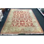 Room size beige patterned carpet 318x236cm.