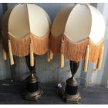 Pair of modern table lamps with brass decoration both with shades, both approx 95cm tall.