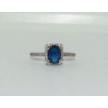 Silver square set dark sapphire ring size O