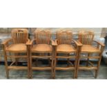 Set of four modern oak bar stools with arms and backs each measuring 109x55x45cm, Seat height 75cm.