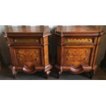 A pair of modern decorative mahogany three drawer bedside units each measuring 58x42x67cm.