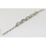 A silver blue topaz bracelet