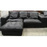 Black leather three seater settee with matching footstool. Settee: 227x88x66cm, Footstool: