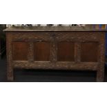 Good elm coffer with carved panels and original metal fitments solid plank top missing part of