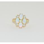 A Gold on silver opaline ring, Size L.