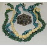 Turquoise Ivory and jadite necklaces together a scotch brooch