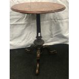 Inlaid mahogany wine table on tripod base 64cm tall 48cm diameter.