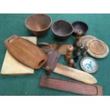 Box of mixed wooden wares including bowls.