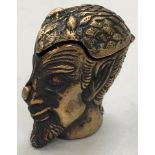 A brass vesta case in the form of the devils head