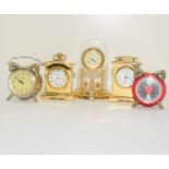 5 Miniature brass clocks