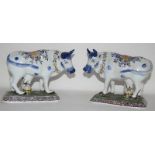 Pair of well decorated Delft tin-glazed cows, fully marked & signed to base 7.8" length 6.2" high.