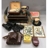 Box of mixed curios to include binoculars.