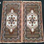 Pair of French ?Tunisia? floor rugs with diamond set pattern 150x75cm each