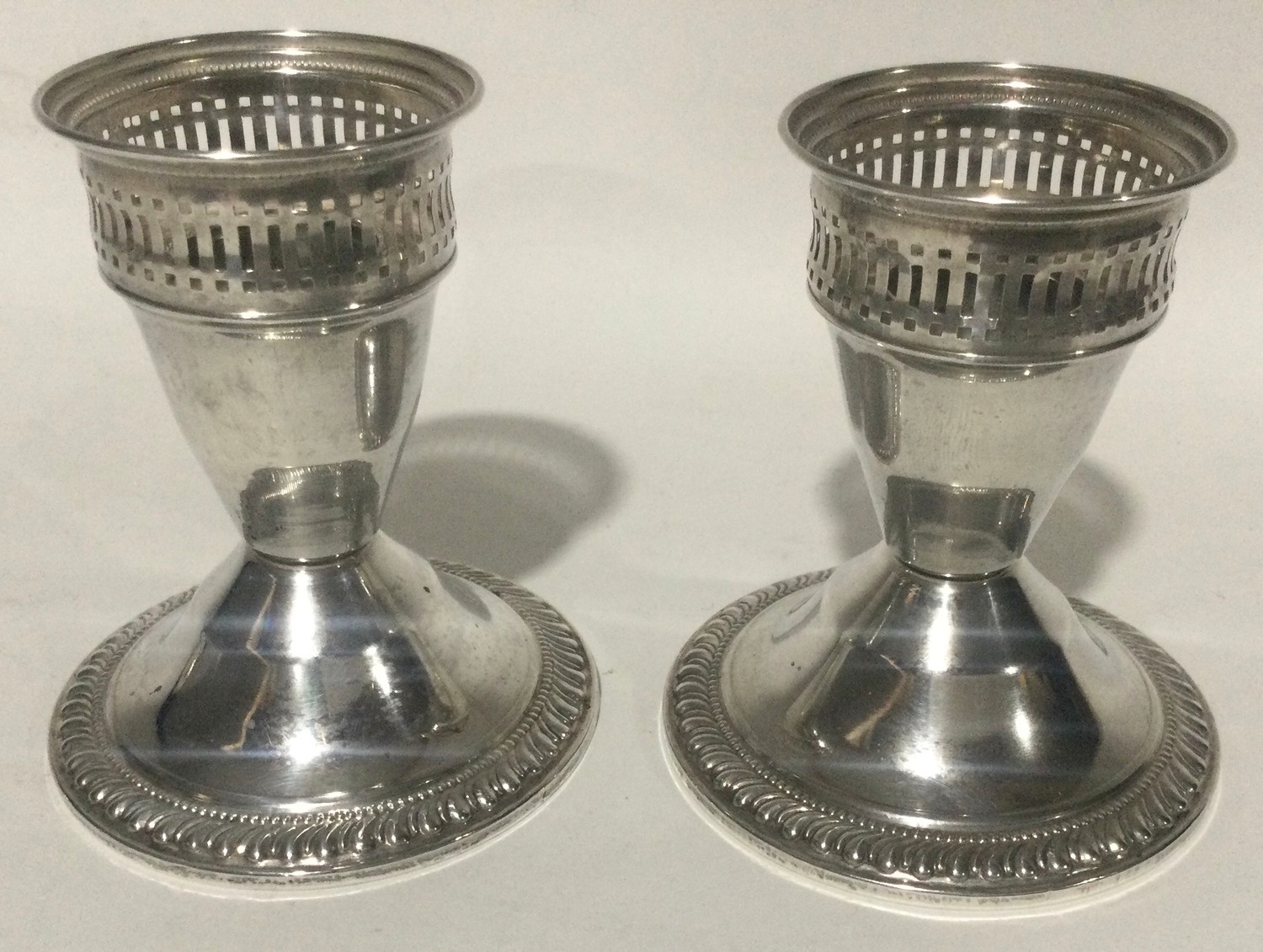 Pair sterling silver dwarf candle sticks 8cm tall