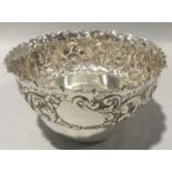 Silver hallmarked embossed bowl with fluted rim weight 170g.