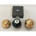 Novelty "8" ball ladies compact together with a boxed "Arc" ladies powder compact and another (3).