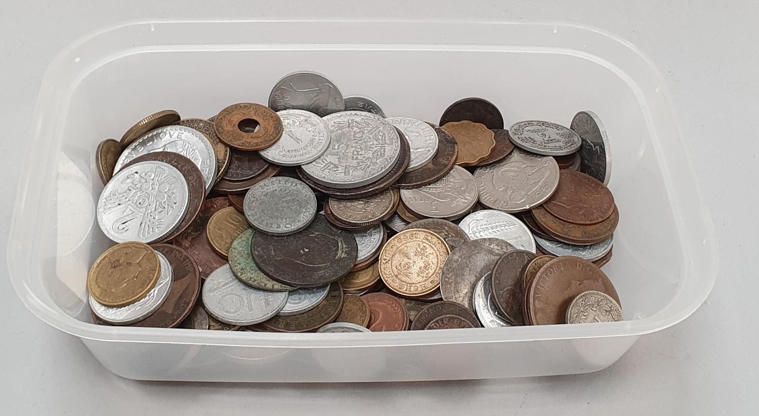 Plastic tub of various coinage.