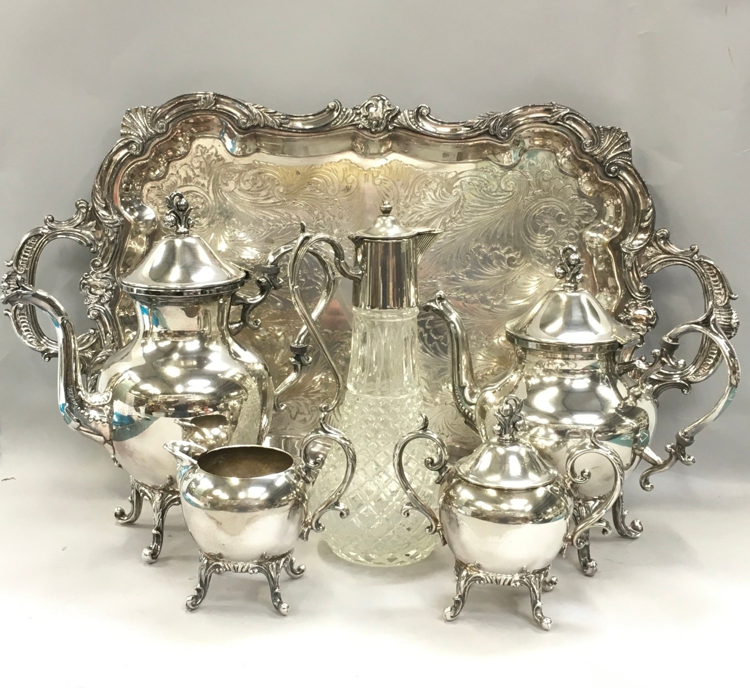 Silver plated 4 piece teaset together a silver plate butlers tray and a claret jug