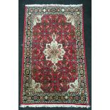 Red Iranian rug in a red set pattern 130x70cm
