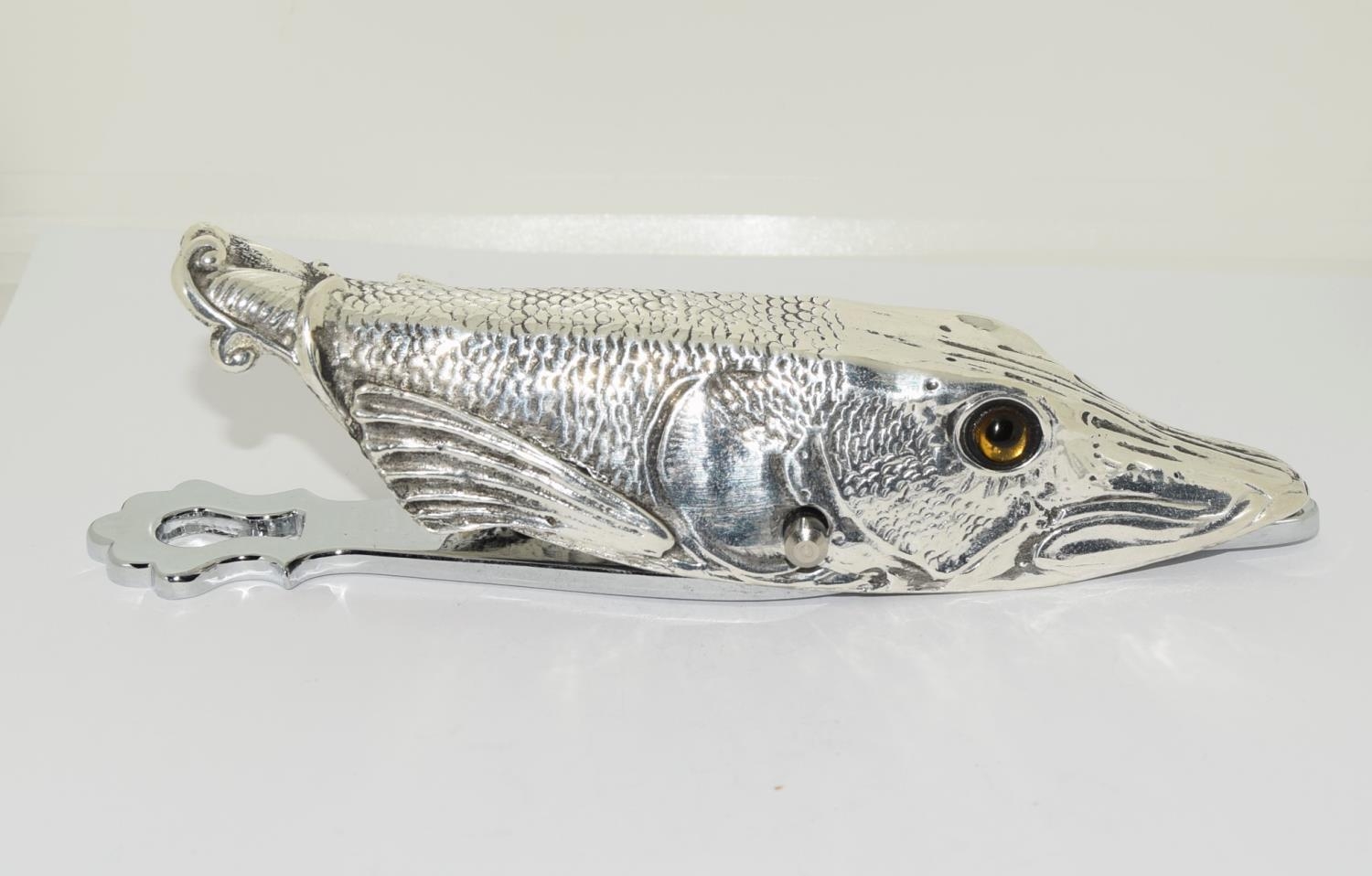 Silver plated document clip in the form of a fish